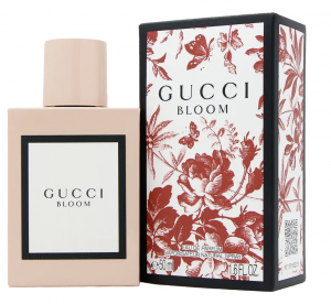 Powdery perfume, Gucci Bloom box and bottle