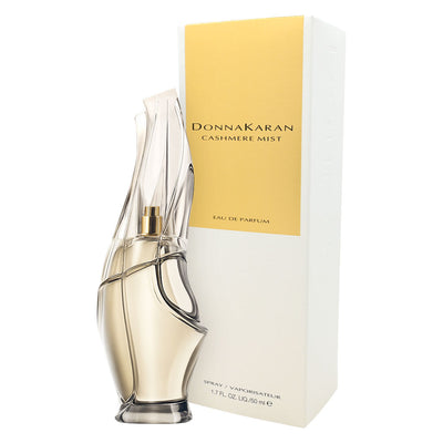 Donna Karan Cashmere Mist EDP women's full-size retail bottle (50ml/1.7 fl oz): sculpted clear glass with gold cap and spray atomizer.
